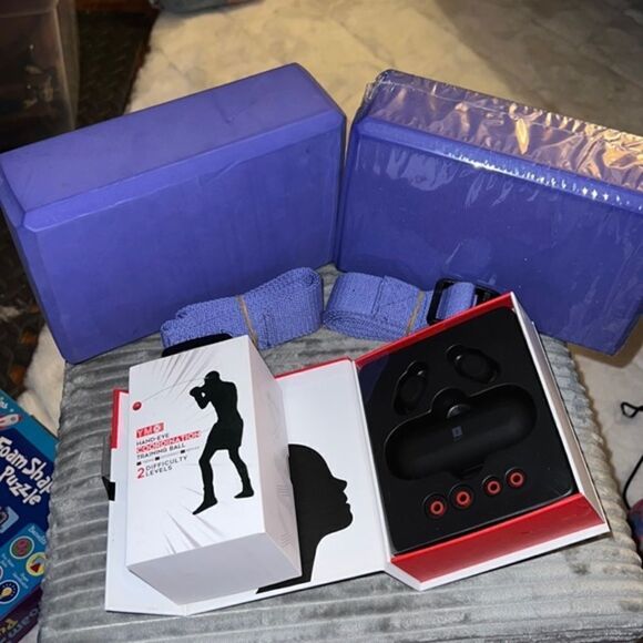 Workout ear buds , yoga squares, two belts and hand eye trading‎ ball for head. - Picture 1 of 5